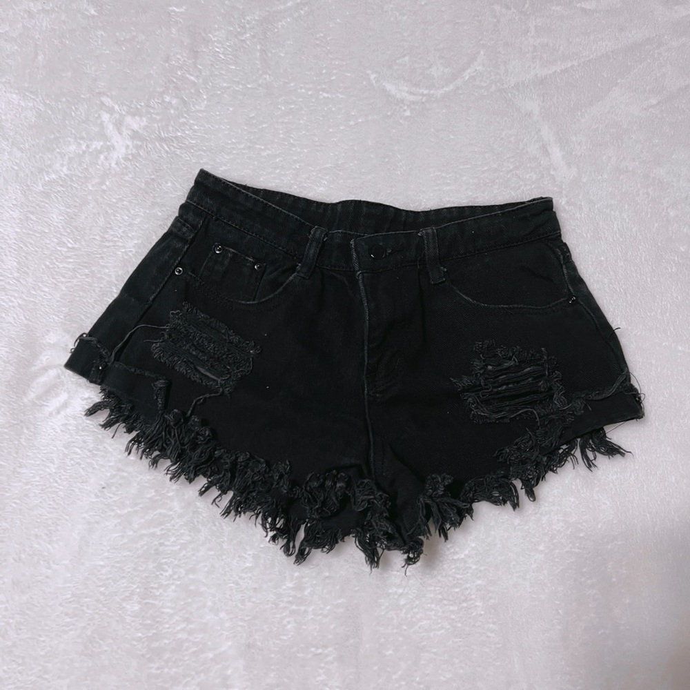 black ripped jean shorts